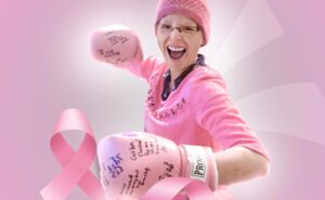 A photo illustration of a cancer survivor beating the disease.